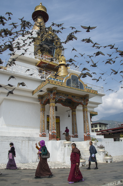 Buddhists circumnavigating Memorial Chorten in prayer, Thimpu
