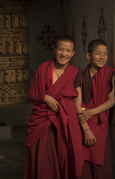 Monks inside Chimmi Lhakhang monestary, Punakha, Bhutan
