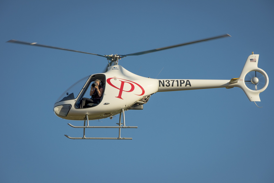 Photographing out of Precision Helicopter 2 person helicopter with door removed 
