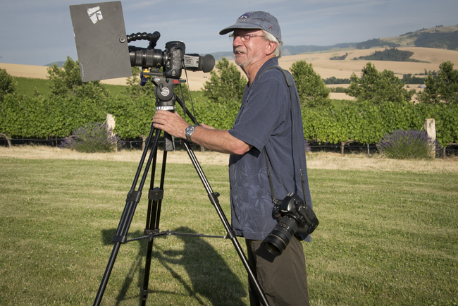 Bob Holmes capturing detail of Figgins Family vineyard event for 2nd camera